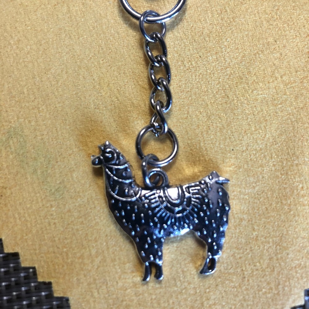 NWT, Handmade by A Charmed Life. Silver Alpaca on Silver Chain
